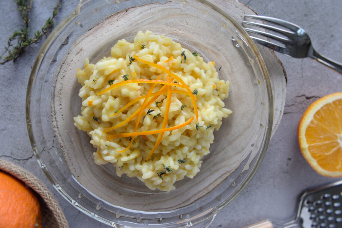 Ricetta facile e invernale del risotto al profumo di arancia e timo